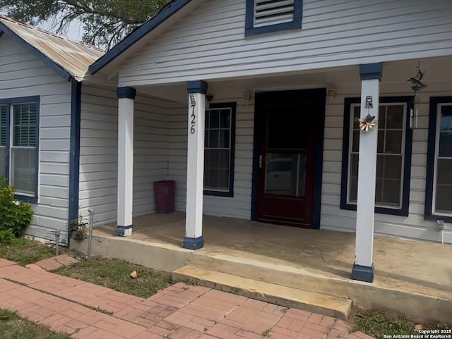 726 Ave L, Poteet, TX 78065 - entrance to property with a porch