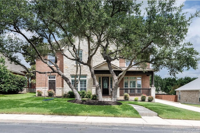 21910 Barton Woods, San Antonio, TX 78259 - view of property hidden behind natural elements with stone siding and covered porch