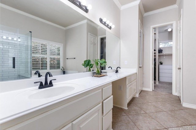 21910 Barton Woods, San Antonio, TX 78259 - full bath featuring double vanity, ornamental molding, a stall shower, tile patterned flooring, and baseboards