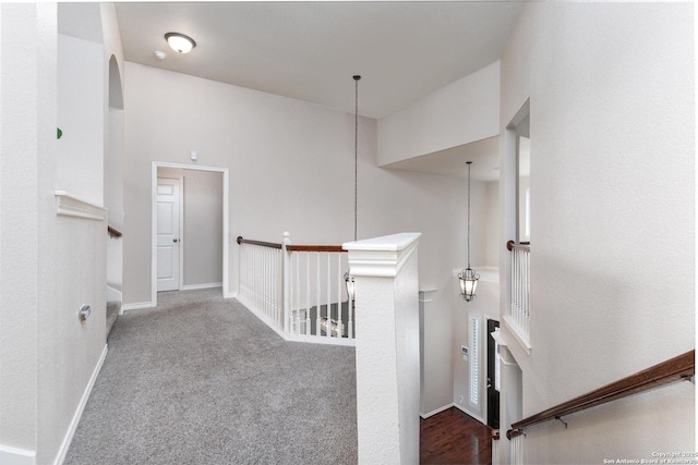 21910 Barton Woods, San Antonio, TX 78259 - hall featuring an upstairs landing, carpet floors, baseboards, and arched walkways