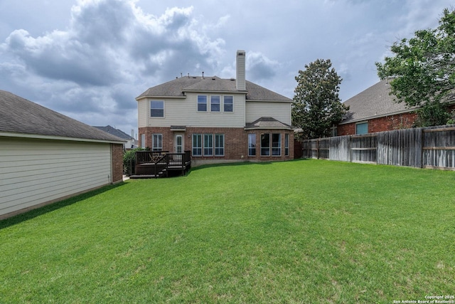 21910 Barton Woods, San Antonio, TX 78259 - back of property featuring brick siding, a chimney, and a deck