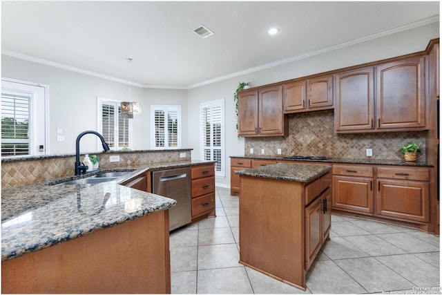 21910 Barton Woods, San Antonio, TX 78259 - kitchen featuring dishwasher, a sink, a kitchen island, decorative backsplash, and dark stone counters