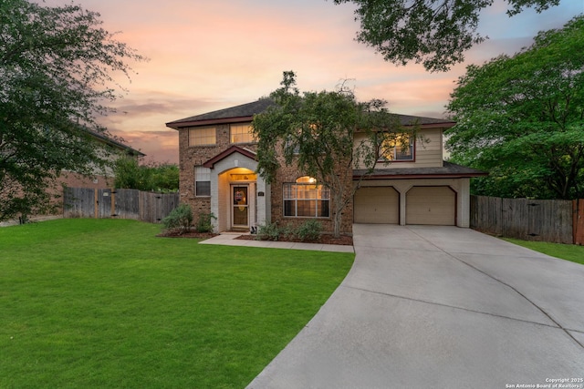 122 Rimdale, Universal City, TX 78148 - traditional-style home with an attached garage, driveway, and brick siding