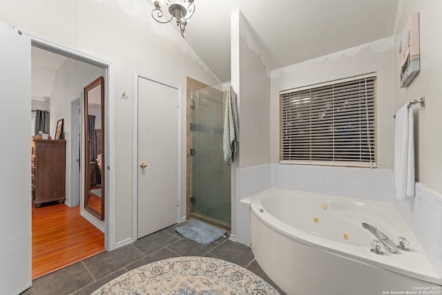 122 Rimdale, Universal City, TX 78148 - full bathroom featuring a stall shower, a whirlpool tub, tile patterned floors, and vaulted ceiling