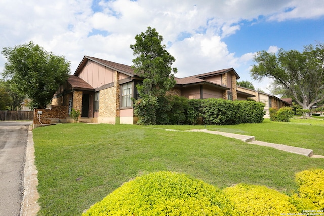 9357 Dover, San Antonio, TX 78250 - view of front facade with brick siding and board and batten siding