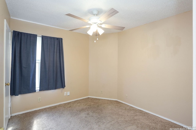 9357 Dover, San Antonio, TX 78250 - carpeted empty room with a ceiling fan, a textured ceiling, and baseboards