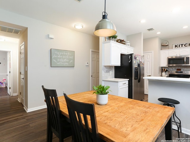 10831 Colt Chase, San Antonio, TX 78254 - dining space featuring dark wood-type flooring, baseboards, and recessed lighting