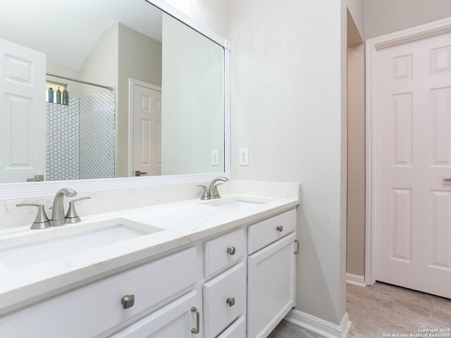 10831 Colt Chase, San Antonio, TX 78254 - bathroom with double vanity, baseboards, and curtained shower