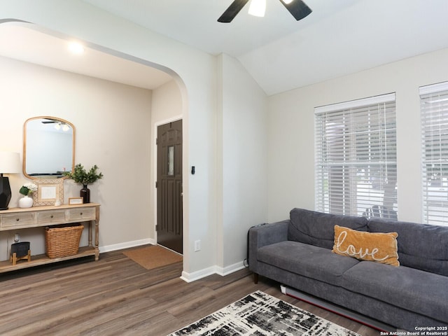 10831 Colt Chase, San Antonio, TX 78254 - living area with arched walkways, wood finished floors, ceiling fan, baseboards, and plenty of natural light