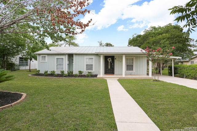 772 Cresthill, San Antonio, TX 78220 - ranch-style house with concrete driveway, a porch, board and batten siding, metal roof, and a carport