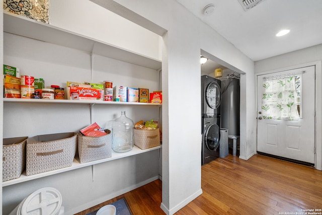 1119 N Pine St, San Antonio, TX 78202 - storage area with stacked washer / drying machine