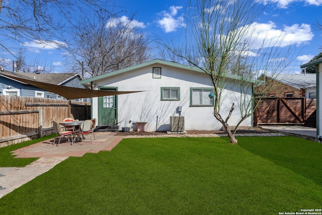 1119 N Pine St, San Antonio, TX 78202 - back of property featuring stucco siding, a patio area, and entry steps