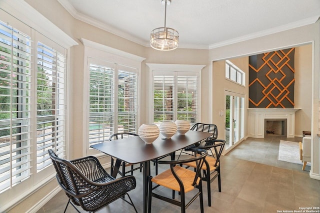 21641 Forest Waters, Garden Ridge, TX 78266 - dining space with healthy amount of natural light, crown molding, and a chandelier