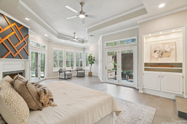 21641 Forest Waters, Garden Ridge, TX 78266 - bedroom featuring french doors, a raised ceiling, ornamental molding, access to exterior, and recessed lighting