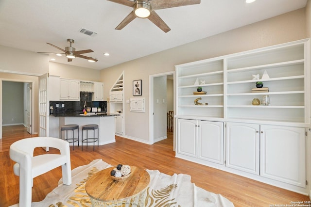 21641 Forest Waters, Garden Ridge, TX 78266 - living area with a ceiling fan, light wood finished floors, baseboards, and recessed lighting