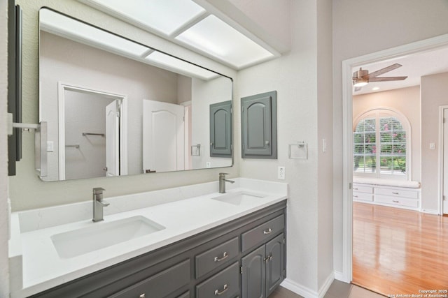 21641 Forest Waters, Garden Ridge, TX 78266 - bathroom featuring double vanity and a ceiling fan