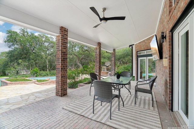 21641 Forest Waters, Garden Ridge, TX 78266 - view of patio / terrace with outdoor dining area, an outdoor pool, and a ceiling fan