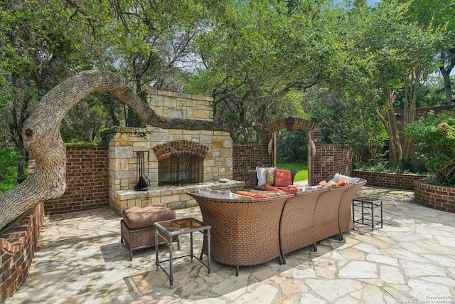 21641 Forest Waters, Garden Ridge, TX 78266 - view of patio / terrace with an outdoor stone fireplace