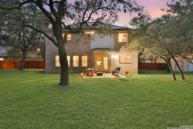 11502 Windwalk, San Antonio, TX 78253 - rear view of house featuring solar panels, brick siding, a patio, and an outbuilding