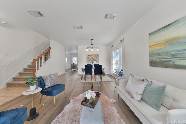 11502 Windwalk, San Antonio, TX 78253 - living room featuring stairs, wood finished floors, and baseboards