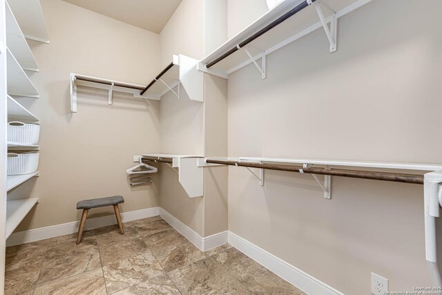 311 Wentworth, Spring Branch, TX 78070 - walk in closet with light stone finish floors