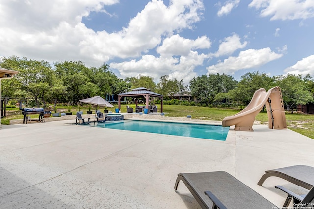 311 Wentworth, Spring Branch, TX 78070 - view of pool featuring a gazebo, a patio area, a water slide, a lawn, and area for grilling