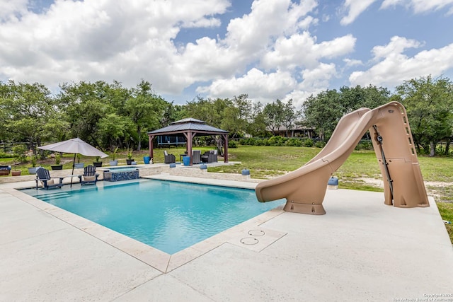 311 Wentworth, Spring Branch, TX 78070 - view of pool with a water slide, a gazebo, a patio, a yard, and a pool with connected hot tub