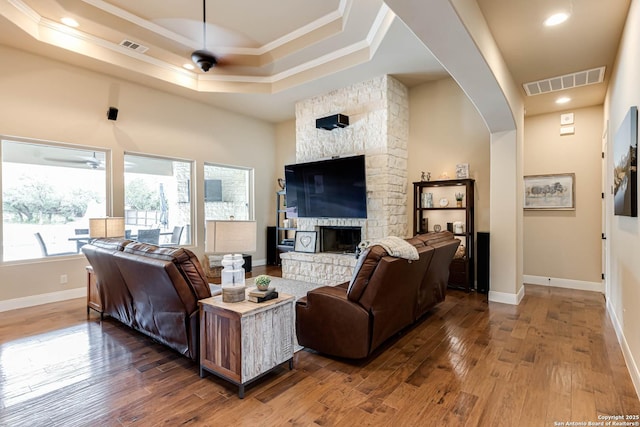 311 Wentworth, Spring Branch, TX 78070 - living area featuring ceiling fan, ornamental molding, wood-type flooring, arched walkways, and baseboards