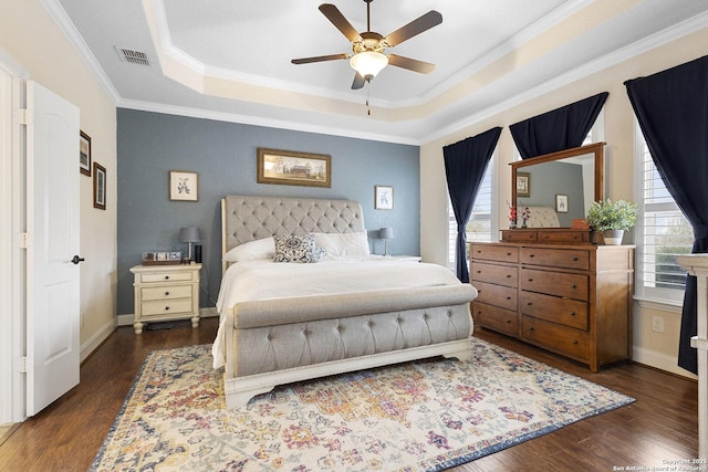 9718 Rosemire Way, San Antonio, TX 78254 - bedroom featuring a tray ceiling, crown molding, wood finished floors, a ceiling fan, and baseboards