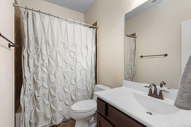9718 Rosemire Way, San Antonio, TX 78254 - bathroom featuring vanity, toilet, shower / bath combo with shower curtain, and a textured wall
