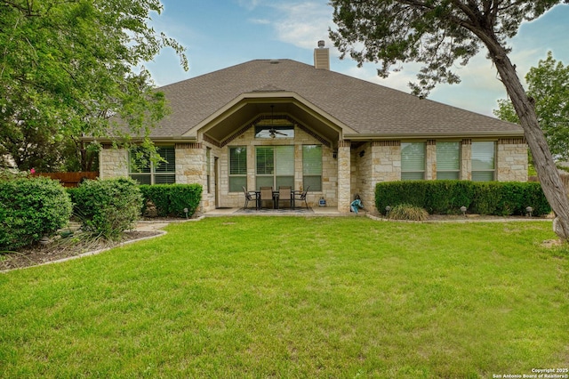 9718 Rosemire Way, San Antonio, TX 78254 - rear view of property featuring stone siding, a shingled roof, a chimney, and a patio