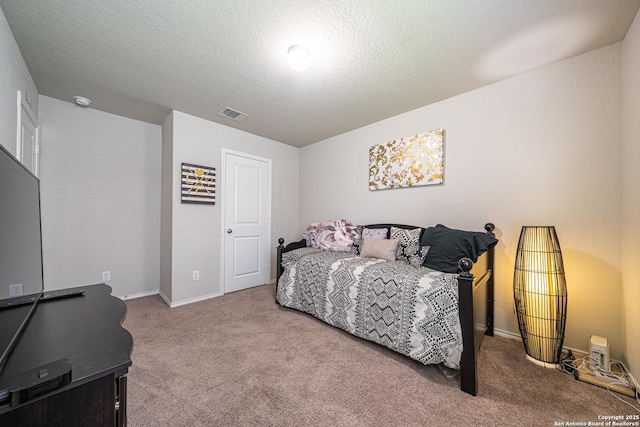 8411 Terlingua Cv, Converse, TX 78109 - carpeted bedroom featuring baseboards and a textured ceiling