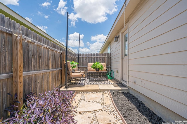 8411 Terlingua Cv, Converse, TX 78109 - fenced backyard featuring a patio area