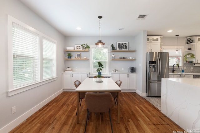 203 Rehmann, San Antonio, TX 78204 - dining space with healthy amount of natural light, baseboards, dark wood-type flooring, and recessed lighting