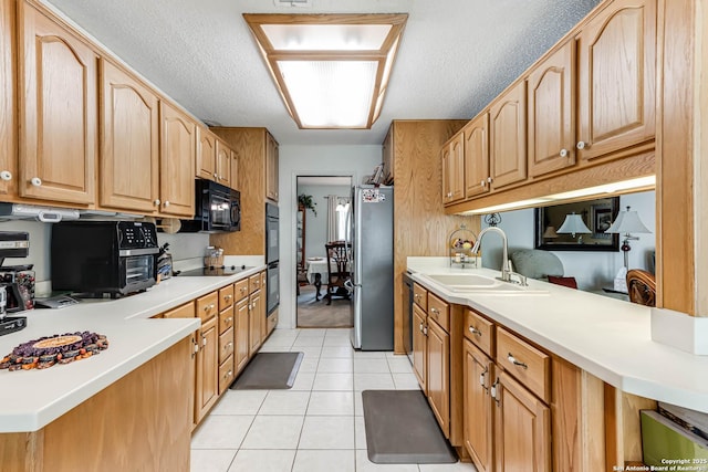 16519 Burr Hill, San Antonio, TX 78247 - kitchen with black appliances, a sink, light tile patterned flooring, light countertops, and a textured ceiling