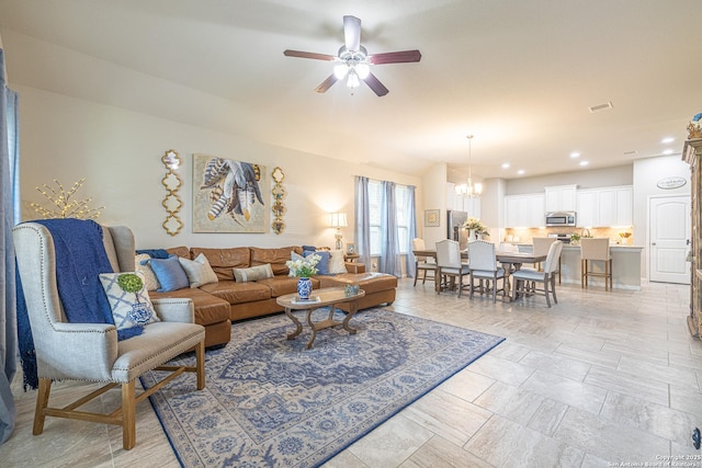 2705 Merlin Ln, Pearland, TX 77581 - living room featuring a ceiling fan, a chandelier, and recessed lighting