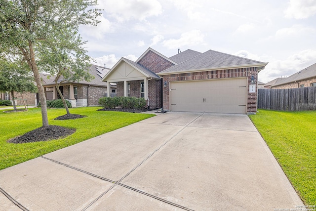 2705 Merlin Ln, Pearland, TX 77581 - view of front of home featuring brick siding, a garage, concrete driveway, and a shingled roof