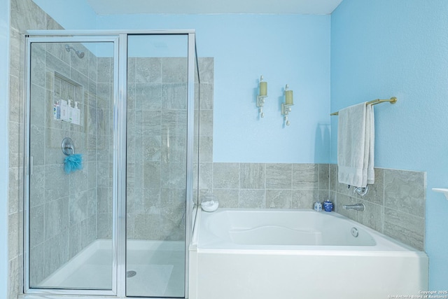 2705 Merlin Ln, Pearland, TX 77581 - bathroom with a bath and a stall shower