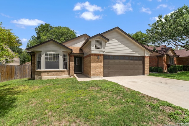 6243 Broadmeadow, San Antonio, TX 78240 - ranch-style house with brick siding, driveway, and an attached garage