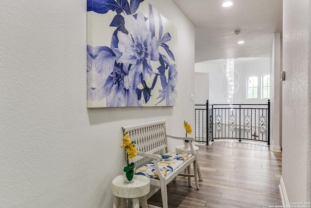 10 Kings Tower, San Antonio, TX 78257 - hallway with a textured wall, wood finished floors, recessed lighting, and a chandelier