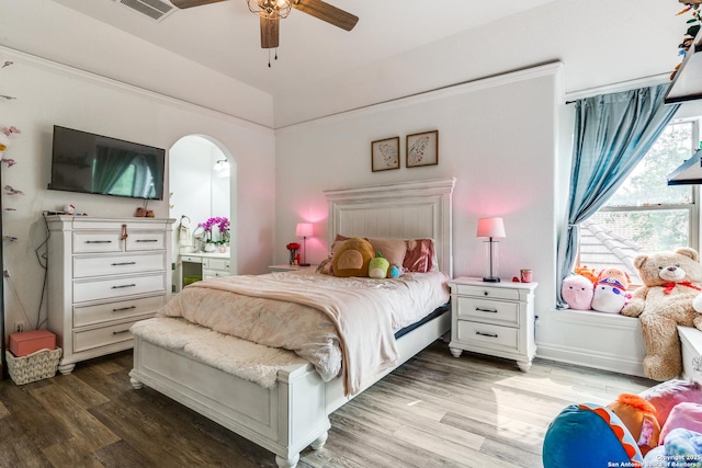 10 Kings Tower, San Antonio, TX 78257 - bedroom featuring arched walkways, wood finished floors, ensuite bathroom, and ceiling fan
