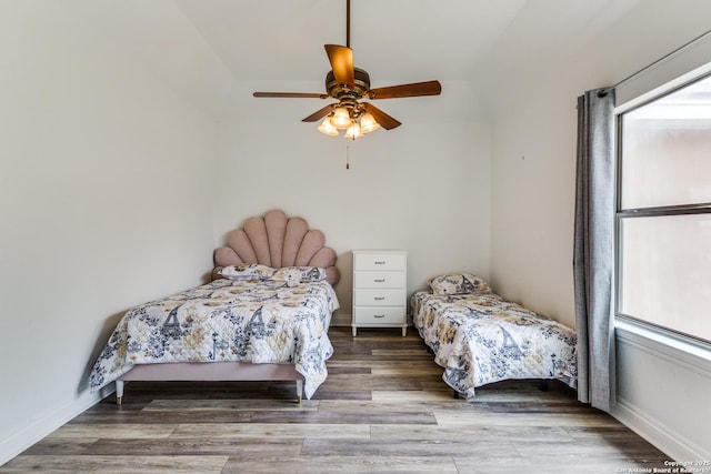 10 Kings Tower, San Antonio, TX 78257 - bedroom with wood finished floors, ceiling fan, vaulted ceiling, and baseboards