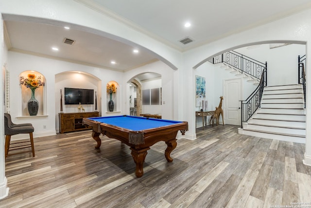 10 Kings Tower, San Antonio, TX 78257 - rec room with crown molding, arched walkways, light wood-style floors, baseboards, and recessed lighting