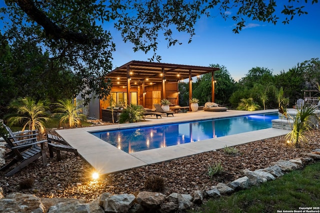 195 Desert Flower, Spring Branch, TX 78070 - outdoor pool featuring an exterior structure, an outbuilding, and a patio area