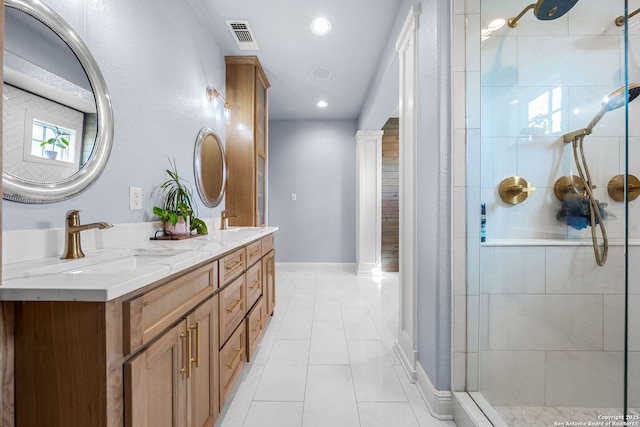 195 Desert Flower, Spring Branch, TX 78070 - bathroom featuring a shower stall, double vanity, recessed lighting, and baseboards