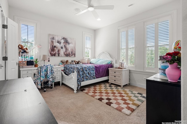 195 Desert Flower, Spring Branch, TX 78070 - bedroom with multiple windows, light colored carpet, and a ceiling fan