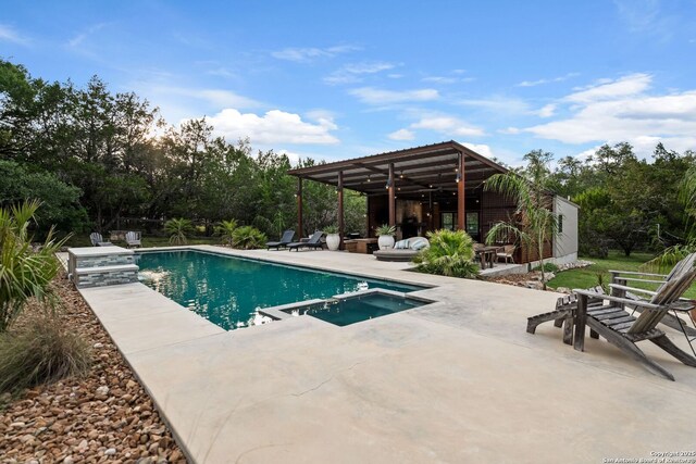 195 Desert Flower, Spring Branch, TX 78070 - view of swimming pool featuring a patio and a pool with connected hot tub