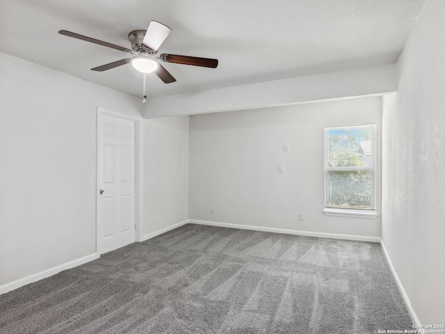942 San Angelo, San Antonio, TX 78201 - empty room with carpet flooring, ceiling fan, and baseboards