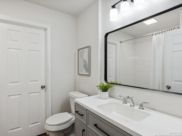 942 San Angelo, San Antonio, TX 78201 - full bath featuring vanity, toilet, a shower with shower curtain, and a textured wall