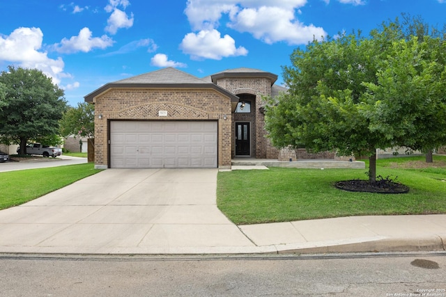 9815 Leubeck Rnch, Helotes, TX 78023 - french country inspired facade with brick siding, an attached garage, a front lawn, and driveway